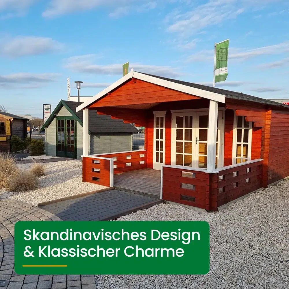 Rotes Holzhaus mit weißem Dach und großen Fenstern steht auf Kies mit Vorgarten